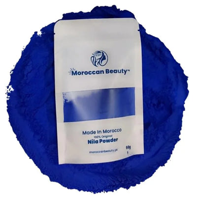 Blue powder with a Moroccan Beauty packaging on a white background